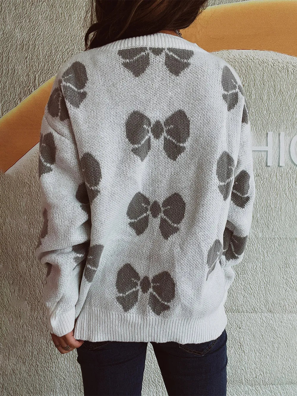 Loose bow sweater