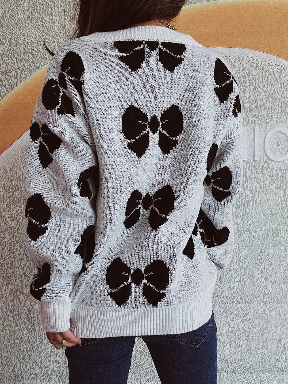 Loose bow sweater